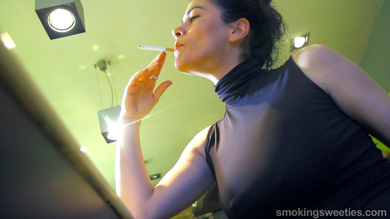 Angela: Chain smoking in a bar