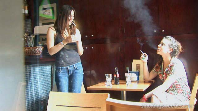 Girls smoking during job break